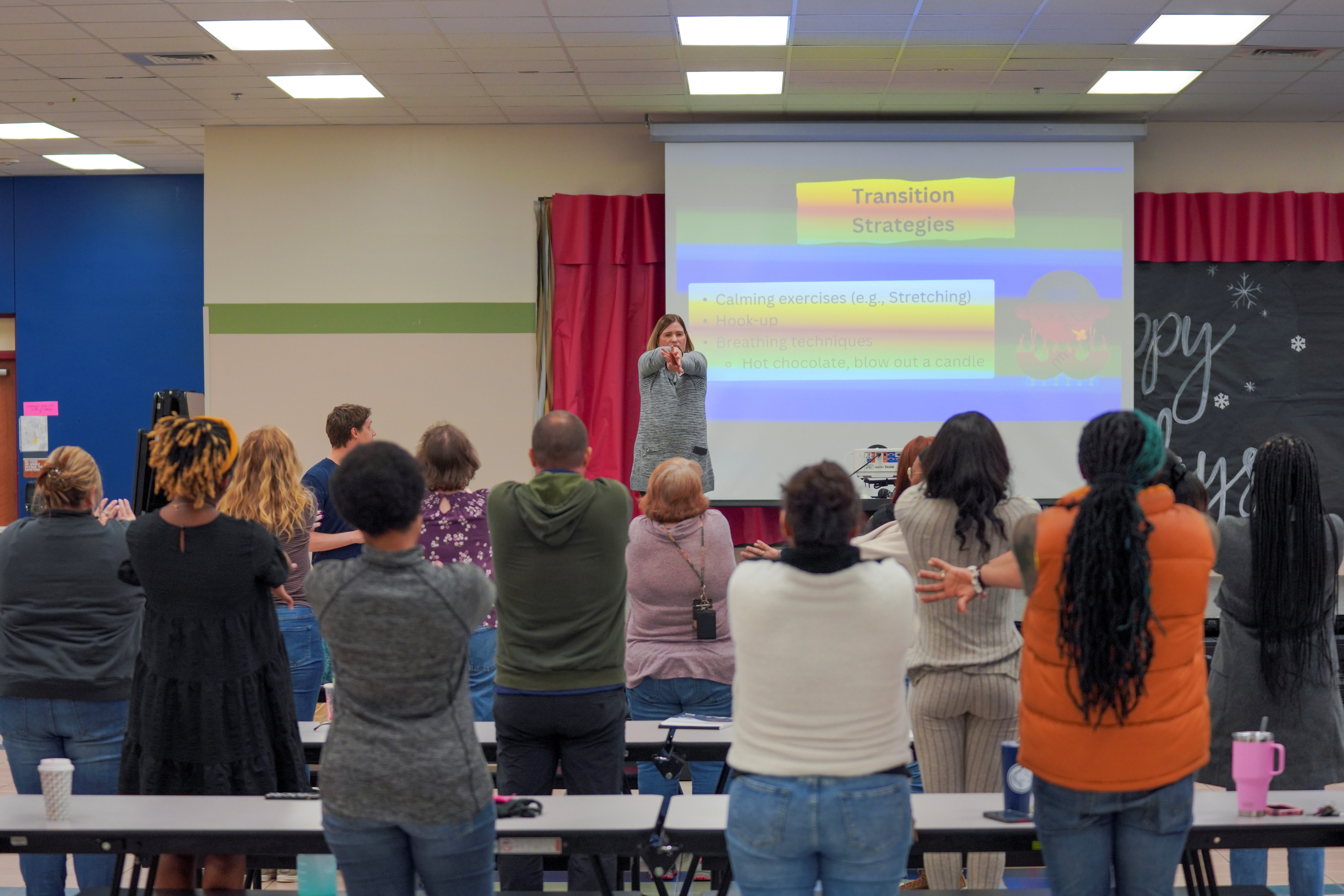 A MAGIC district partner helping lead an in-school training session.